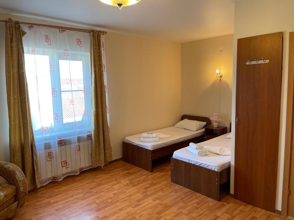 Двухместный (Стандартный двухместный номер с 2 отдельными кроватями) отеля Фортуна, Тамань