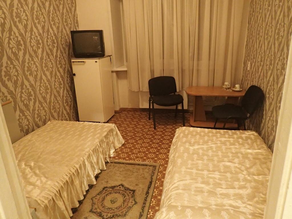 Двухместный (Бюджетный двухместный номер с 2 отдельными кроватями) отеля Сибирь, Новокузнецк