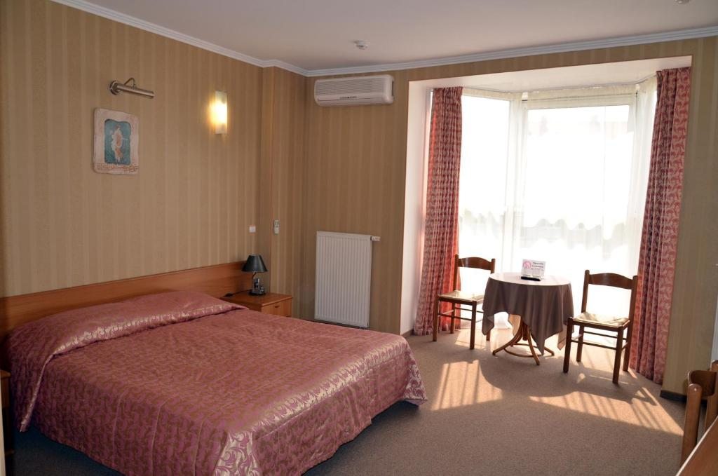 Двухместный (Стандартный двухместный номер с 1 кроватью или 2 отдельными кроватями) отеля Олимп, Светлогорск
