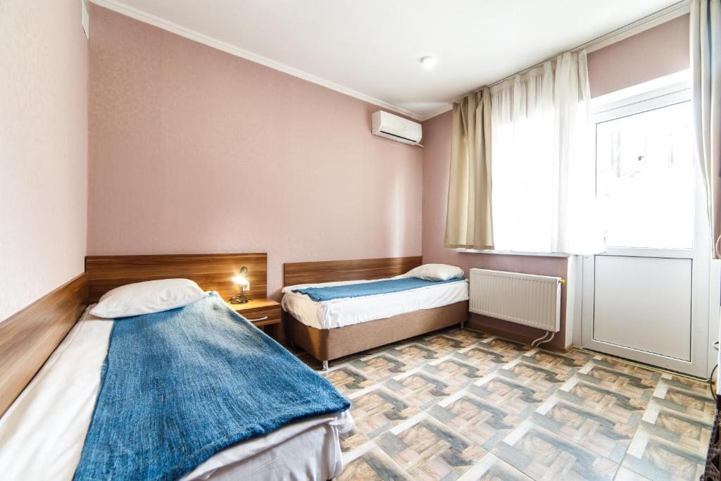 Двухместный (Двухместный номер с 1 кроватью или 2 отдельными кроватями) отеля Лемонграсс, Адлер