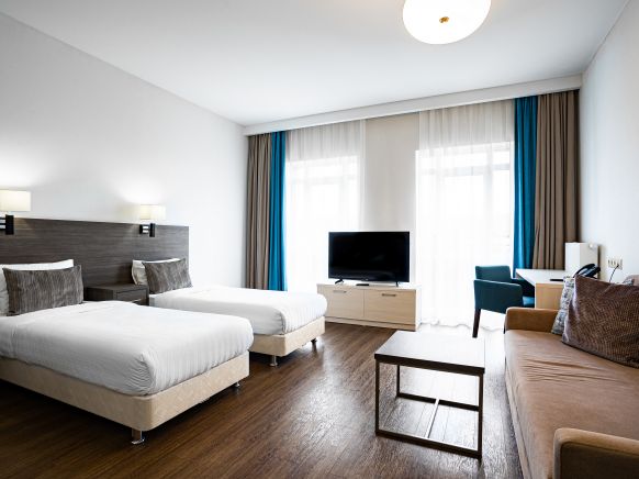 Фотография номера апарт отеля Рамада Новосибирск Жуковка