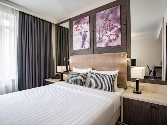 Фотография номера апарт отеля Рамада Новосибирск Жуковка