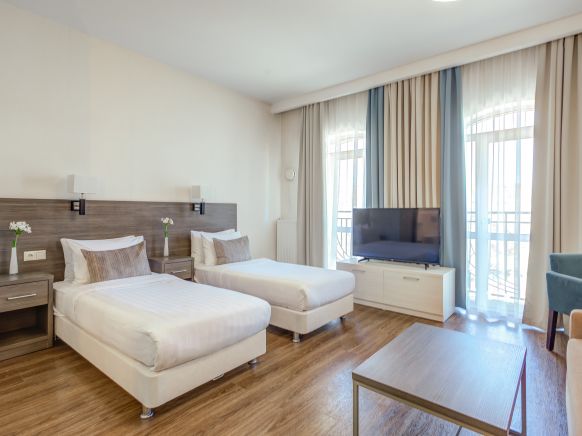 Фотография номера апарт отеля Рамада Новосибирск Жуковка