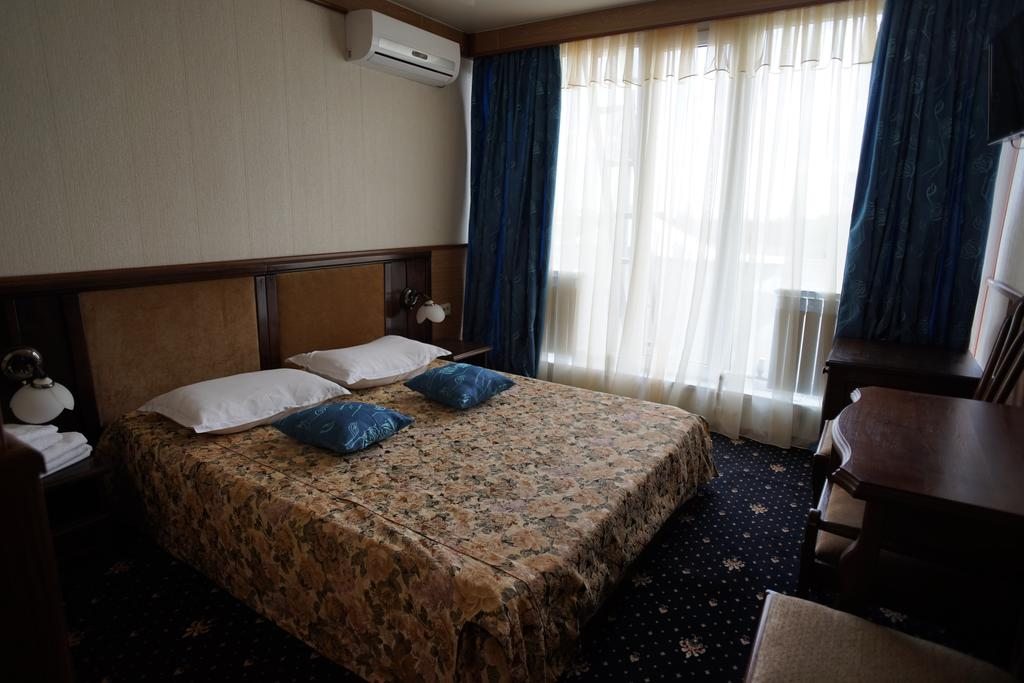 Двухместный (Двухместный номер Делюкс с 1 кроватью или 2 отдельными кроватями) отеля Дилижанс, Батайск