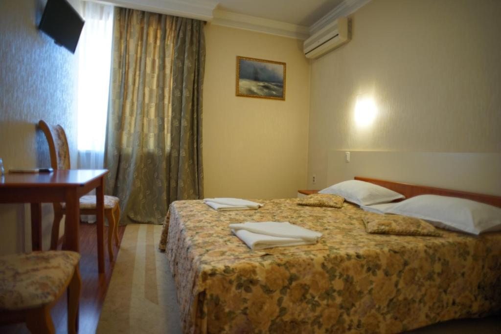 Двухместный (Стандартный двухместный номер с 1 кроватью или 2 отдельными кроватями) отеля Дилижанс, Батайск