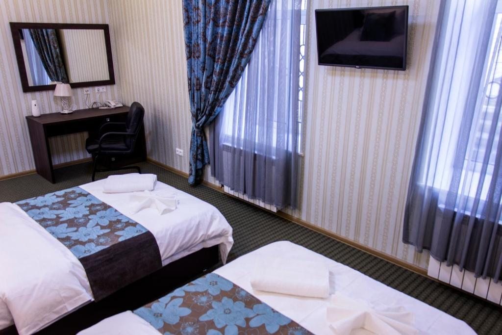 Двухместный (Стандартный двухместный номер с 2 отдельными кроватями) отеля Шанхай, Санкт-Петербург