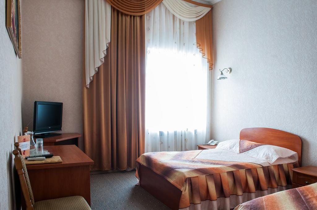 Двухместный (Улучшенный двухместный номер с 2 отдельными кроватями) гостиницы Кольцо, Клинцы