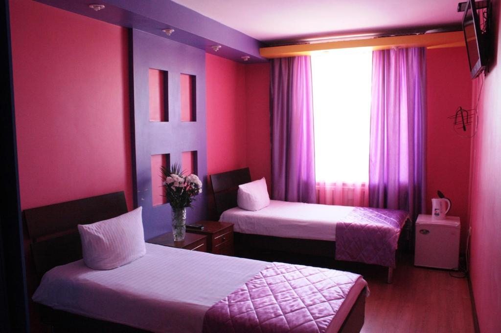 Двухместный (Улучшенный двухместный номер с 2 кроватями) отеля Зарайск ТГК