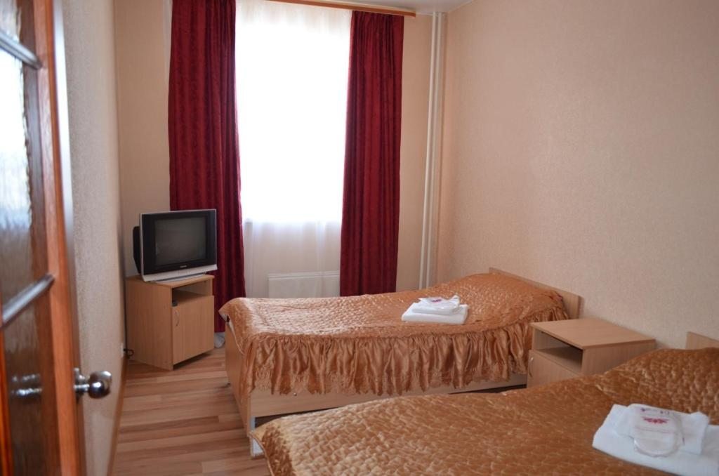 Апартаменты (Апартаменты с 2 спальнями) отеля Сибирь на Строителей, Тарко Сале