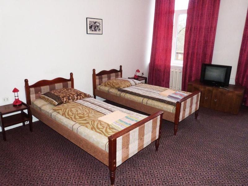 Двухместный (Просторный двухместный номер с 2 отдельными кроватями) отеля у Медведя, Черняховск