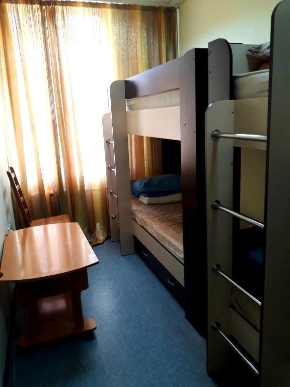 Номер (Спальное место на двухъярусной кровати в общем номере для мужчин) отеля Лидер, Томск