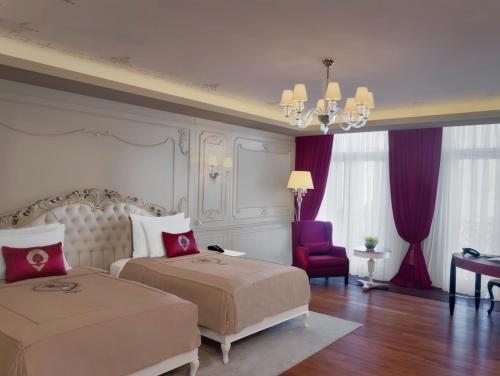 Двухместный (Представительский номер с правом посещения лаунджа, вид на город) отеля CVK Park Bosphorus Istanbul, Стамбул