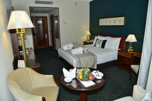 Трехместный (Двухместный номер с 1 кроватью или 2 отдельными кроватями + дополнительной кроватью) отеля Grand Cevahir Hotel Convention Center, Стамбул