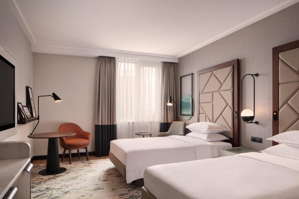 Двухместный (Двухместный номер Делюкс с 2 отдельными кроватями и панорамным видом на город) отеля Mövenpick Hotel Istanbul, Стамбул
