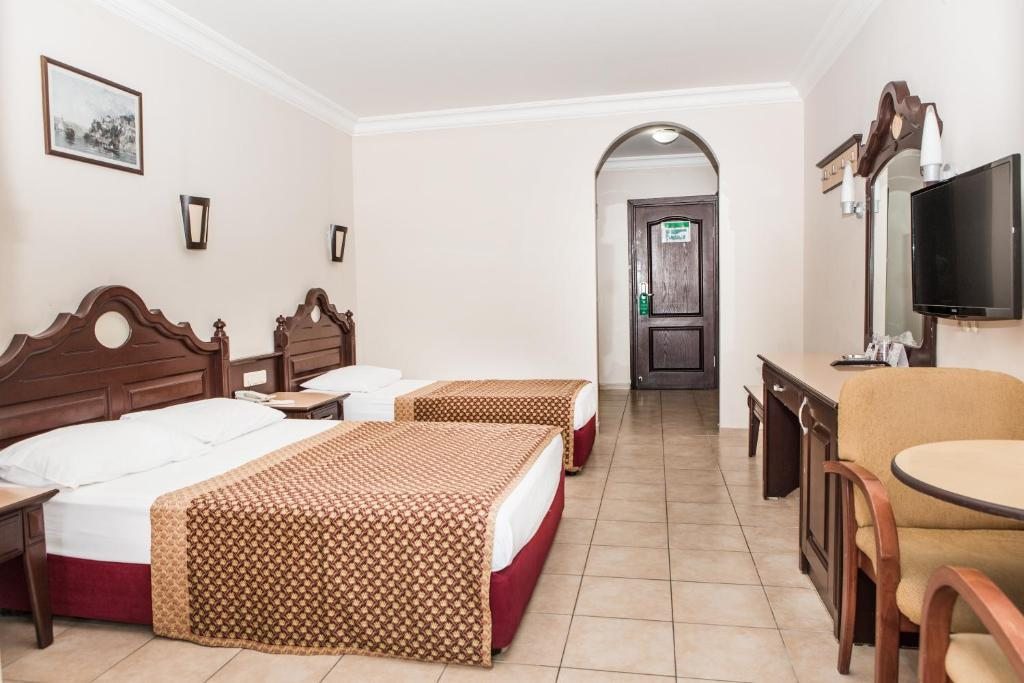 Трехместный (Двухместный номер с 1 кроватью и дополнительной кроватью (для 3 взрослых)) курортного отеля Kahya Hotel, Алания