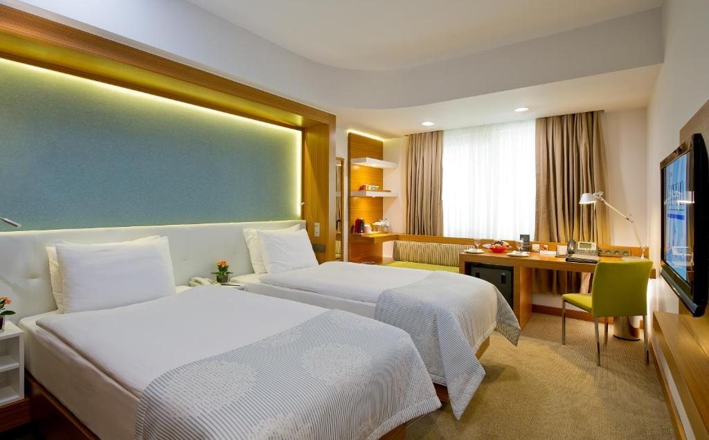 Двухместный (Стандартный двухместный номер с 2 отдельными кроватями) отеля Divan Istanbul City, Стамбул