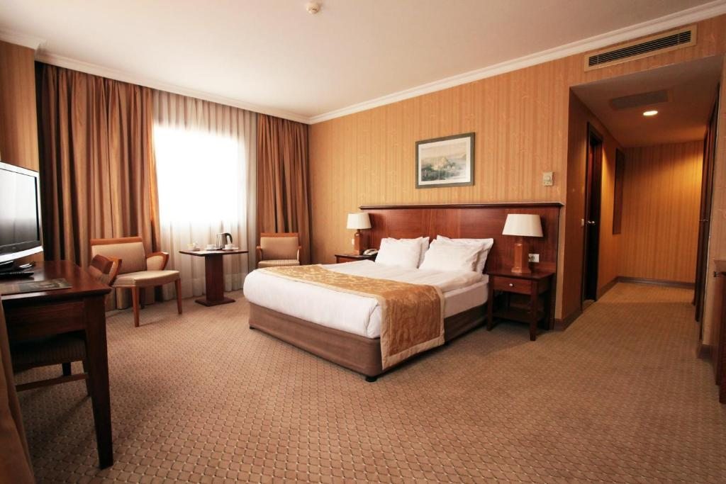 Двухместный (Двухместный номер Делюкс с 1 кроватью или 2 отдельными кроватями) отеля Grand Oztanik, Стамбул