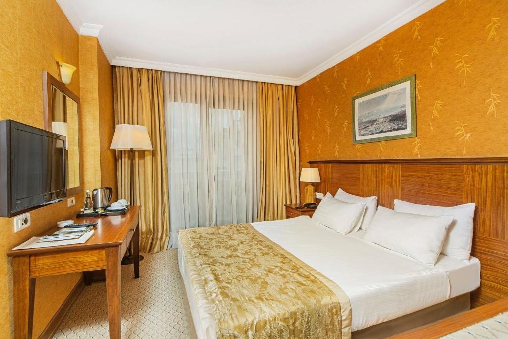 Двухместный (Стандартный двухместный номер с 1 кроватью или 2 отдельными кроватями) отеля Grand Oztanik, Стамбул