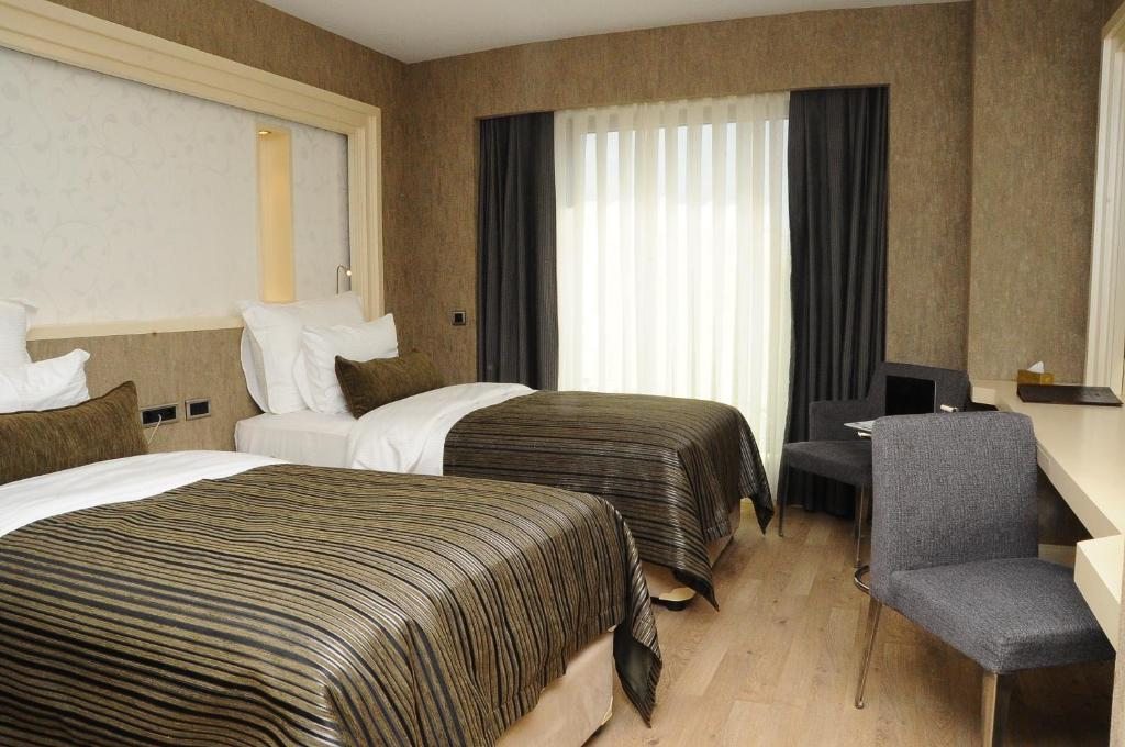 Двухместный (Двухместный номер Делюкс с 2 отдельными кроватями) отеля Limak Eurasia Luxury, Стамбул