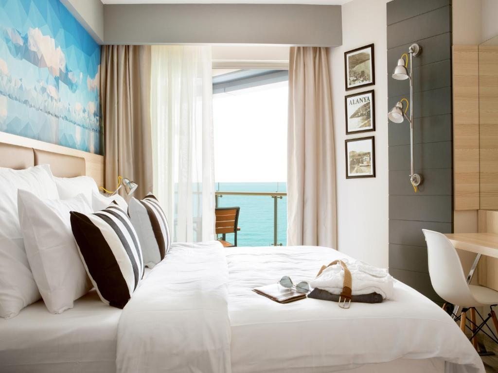 Двухместный (Двухместный номер с 1 кроватью или 2 отдельными кроватями и частичным видом на море) отеля Sunprime C-Lounge - Adult Only, Алания