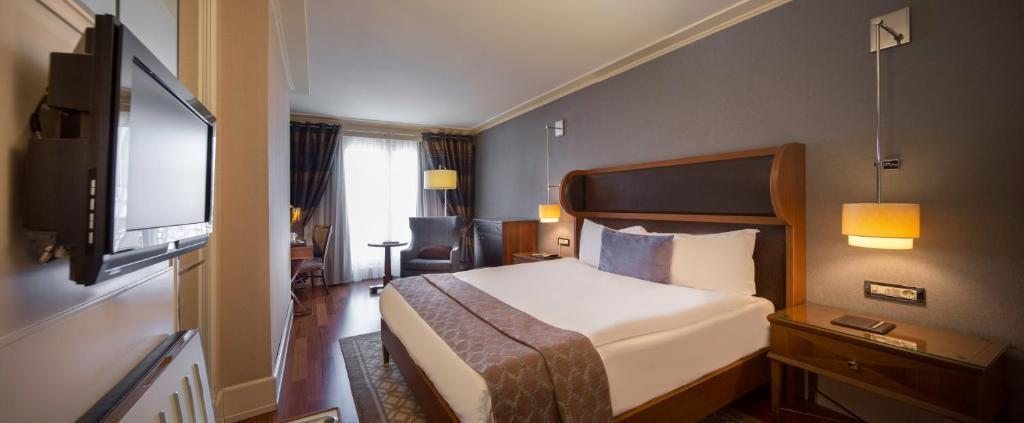Двухместный (Стандартный двухместный номер с 1 кроватью или 2 отдельными кроватями) отеля Titanic City Taksim, Стамбул