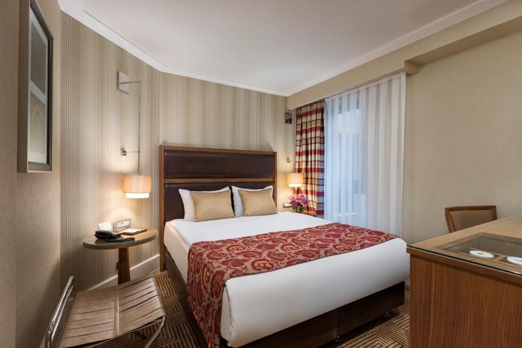 Двухместный (Улучшенный двухместный номер с 1 кроватью или 2 отдельными кроватями) отеля Titanic City Taksim, Стамбул