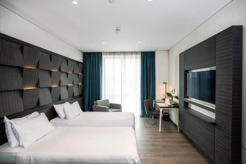Двухместный (Улучшенный двухместный номер с 2 отдельными кроватями) отеля Wish More Hotel Istanbul, Стамбул