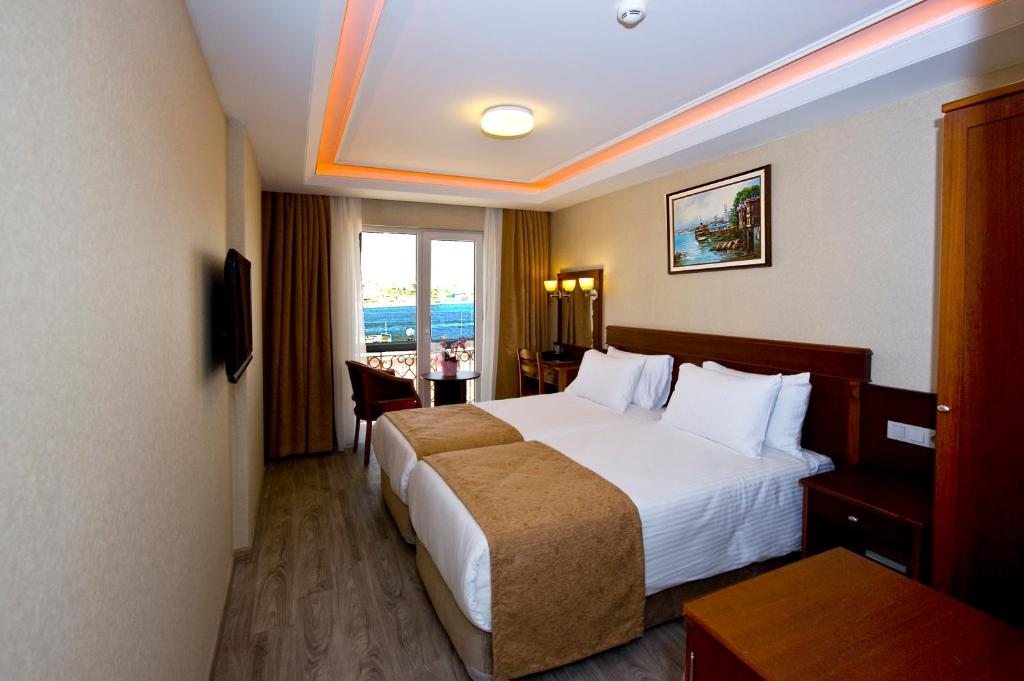 Двухместный (Двухместный номер с 1 кроватью или 2 отдельными кроватями и видом на Босфор) отеля Askoc, Стамбул