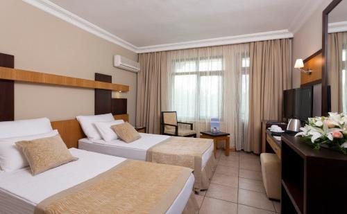 Двухместный (Бюджетный двухместный номер с 2 отдельными кроватями) отеля Kandelor, Алания
