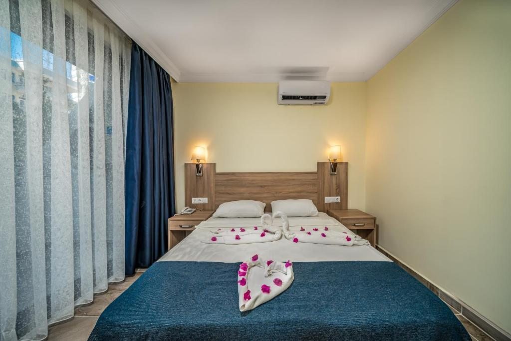 Двухместный (Стандартный двухместный номер с 1 кроватью или 2 отдельными кроватями) отеля Kemalhan Beach, Алания