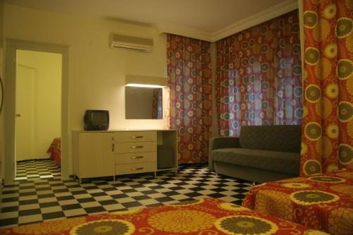 Семейный (Стандартный семейный номер) апарт-отеля Orient Suite, Алания