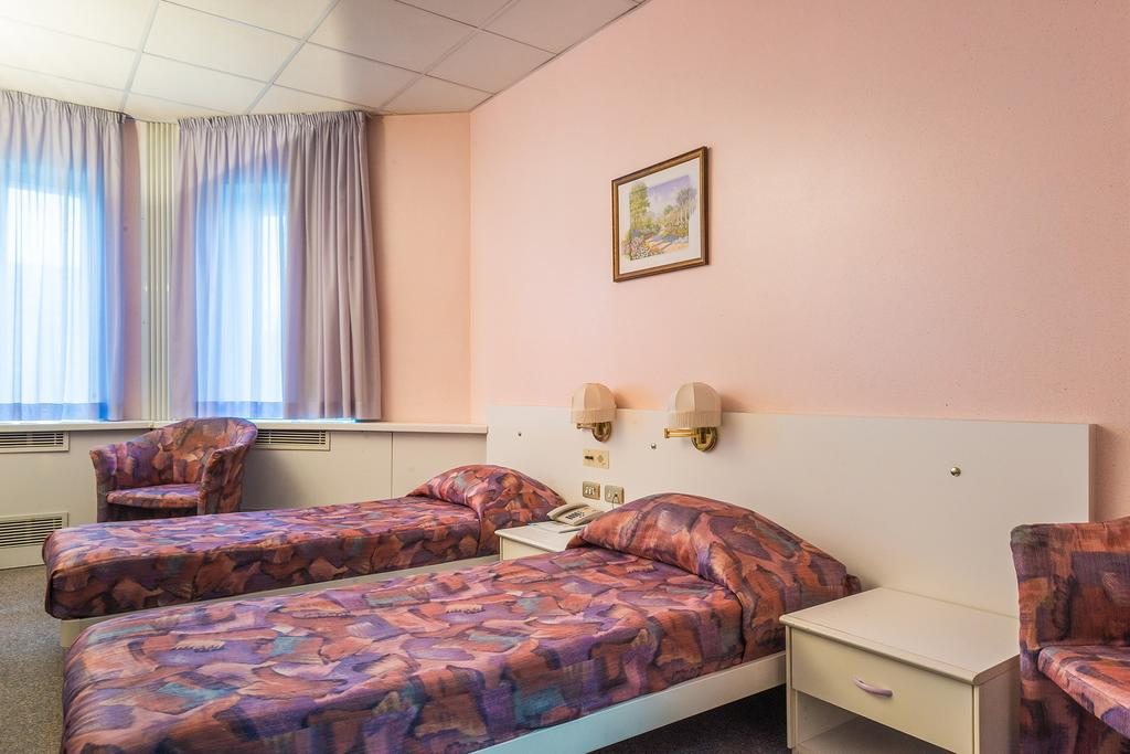 Двухместный (Двухместный номер эконом-класса с 2 отдельными кроватями) отеля Венеция, Нижневартовск