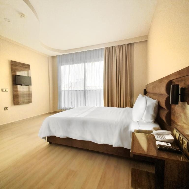 Двухместный (Улучшенный двухместный номер с 1 кроватью) отеля Ozgur Bey Spa Hotel (Adult Only), Алания