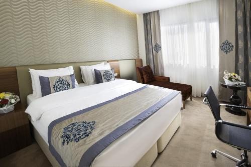Двухместный (Двухместный номер Делюкс с 1 кроватью или 2 отдельными кроватями, вид на море) отеля Ramada Hotel & Suites Istanbul - Atakoy, Стамбул