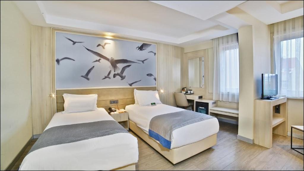 Двухместный (Представительский двухместный номер с 2 отдельными кроватями - Для некурящих) отеля Ramada Istanbul Old City, Стамбул