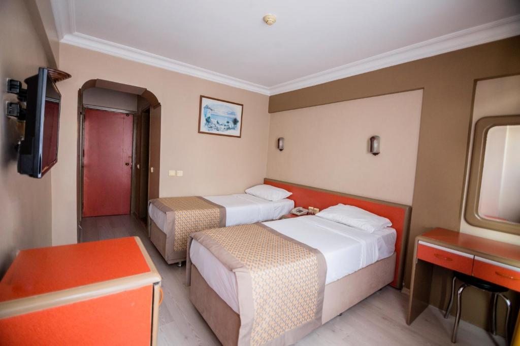 Двухместный (Двухместный номер с 1 кроватью или 2 отдельными кроватями) отеля Sahi̇nler, Стамбул
