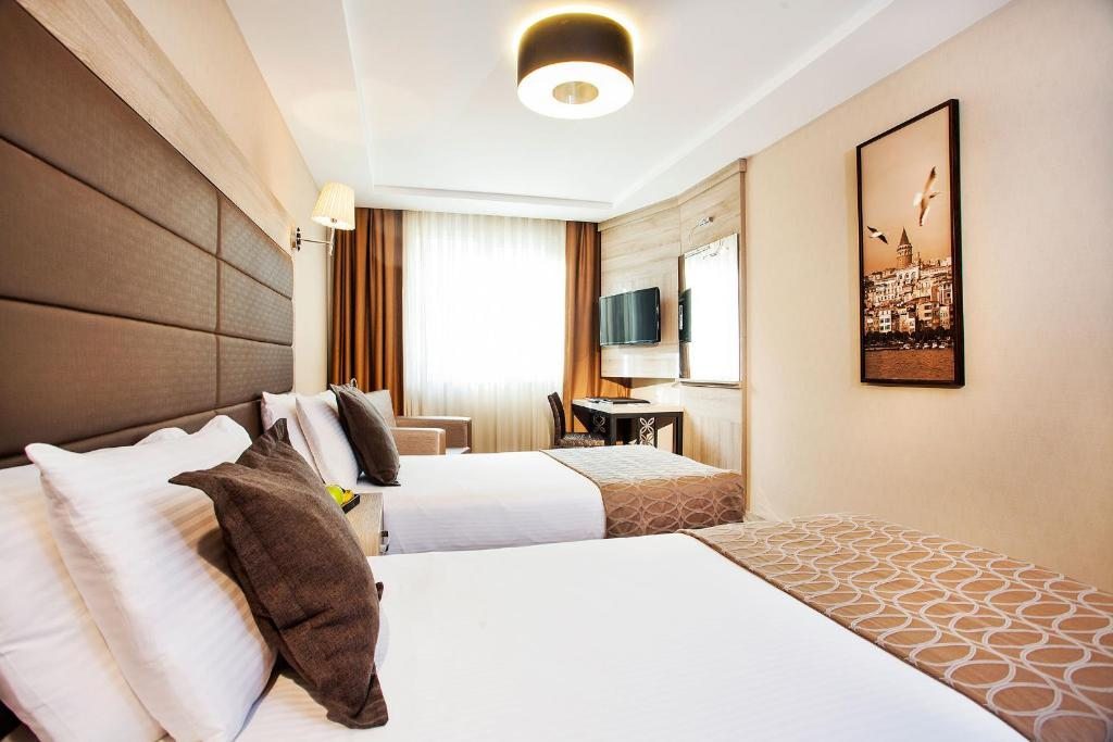 Двухместный (Стандартный двухместный номер с 2 отдельными кроватями) отеля Nidya Hotel Galataport, Стамбул