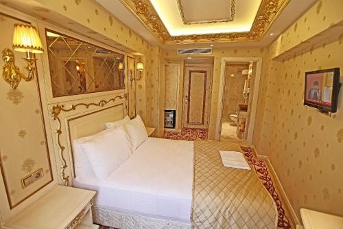Двухместный (Стандартный двухместный номер с 1 кроватью или 2 отдельными кроватями) отеля Hotel Buyuk Hamit, Стамбул