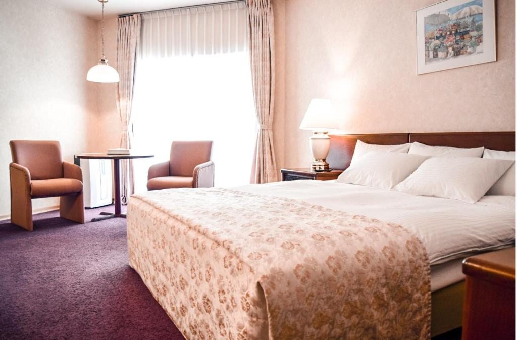 Двухместный (Двухместный номер с кроватью размера «king-size») отеля Санта-Ризот, Южно-Сахалинск