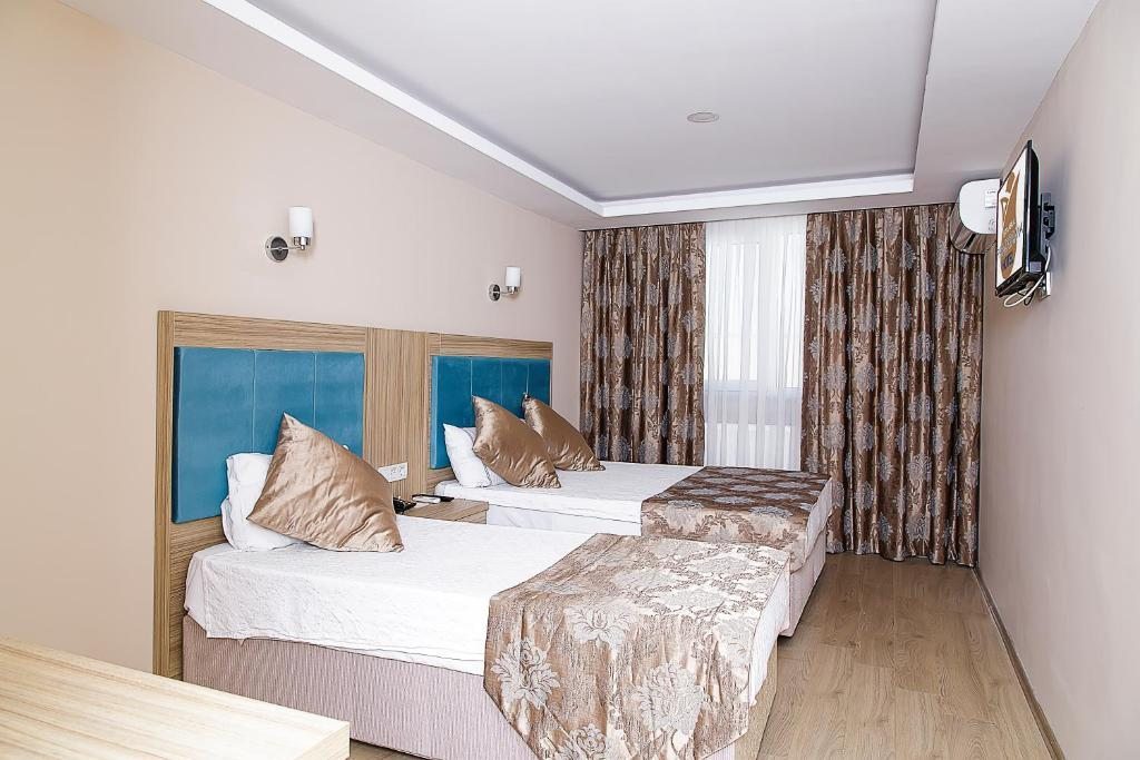 Двухместный (Двухместный номер с 1 кроватью или 2 отдельными кроватями) отеля Panorama Health Club, Стамбул