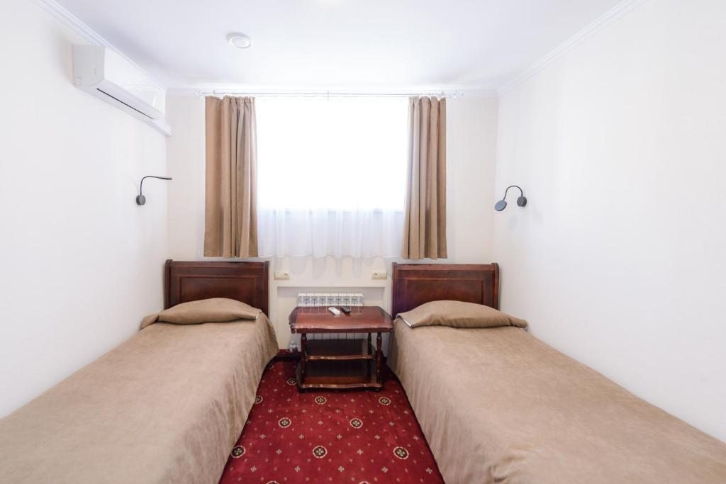 Двухместный (Бюджетный двухместный номер с 2 отдельными кроватями) гостиницы Эль Отель, Ковров