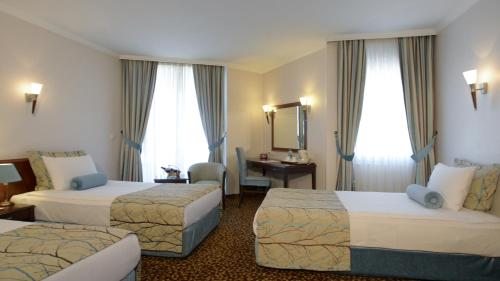 Трехместный (Стандартный трехместный номер) отеля Best Western Plus Khan Hotel, Анталия