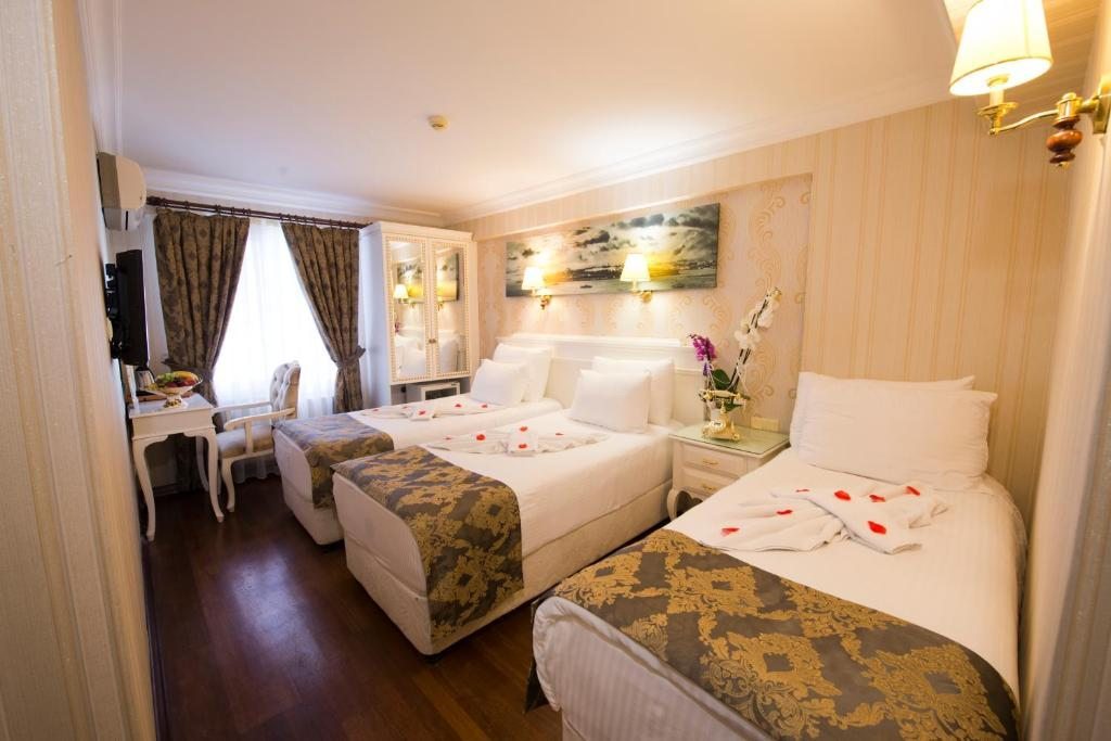 Двухместный (Двухместный номер с 1 кроватью или 2 отдельными кроватями и дополнительной кроватью) отеля Golden Horn, Стамбул