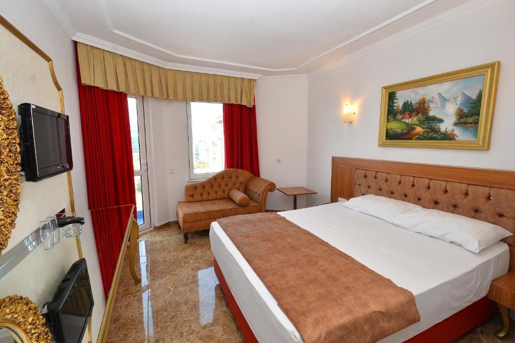 Двухместный (Стандартный двухместный номер с 1 кроватью или 2 отдельными кроватями и боковым видом на море) отеля Kristal Beach, Анталия