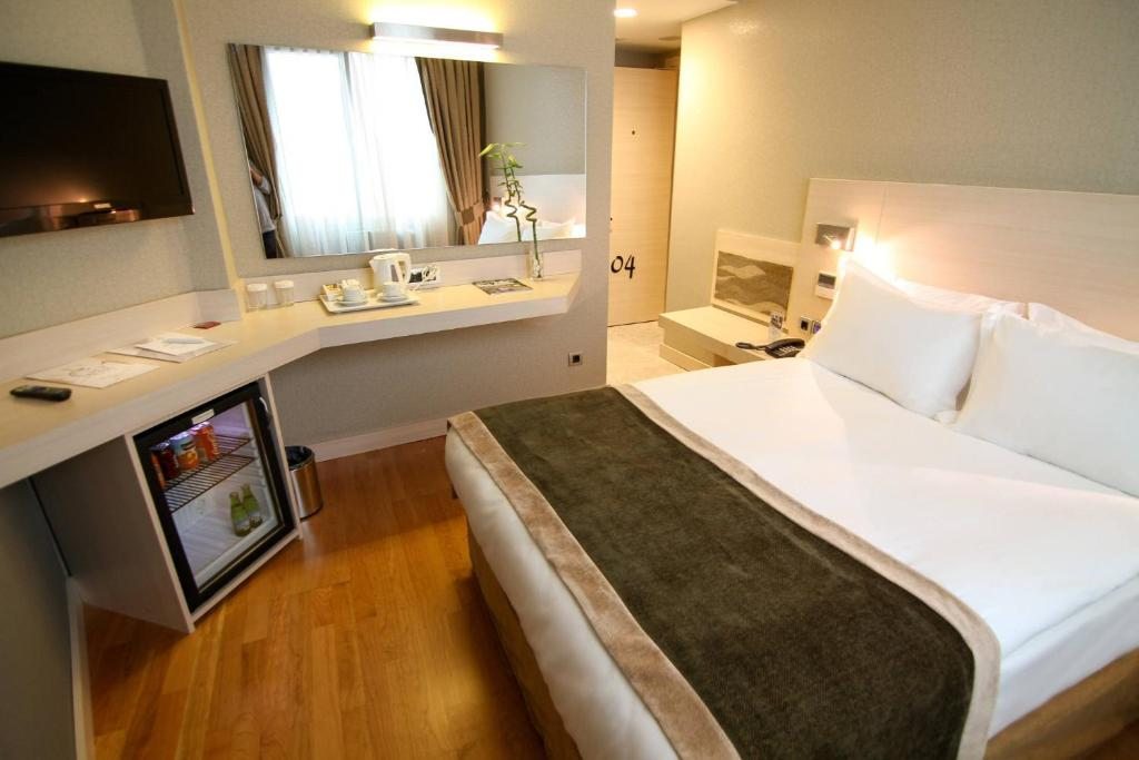 Двухместный (Бюджетный двухместный номер с 1 кроватью или 2 отдельными кроватями) отеля Troya, Стамбул