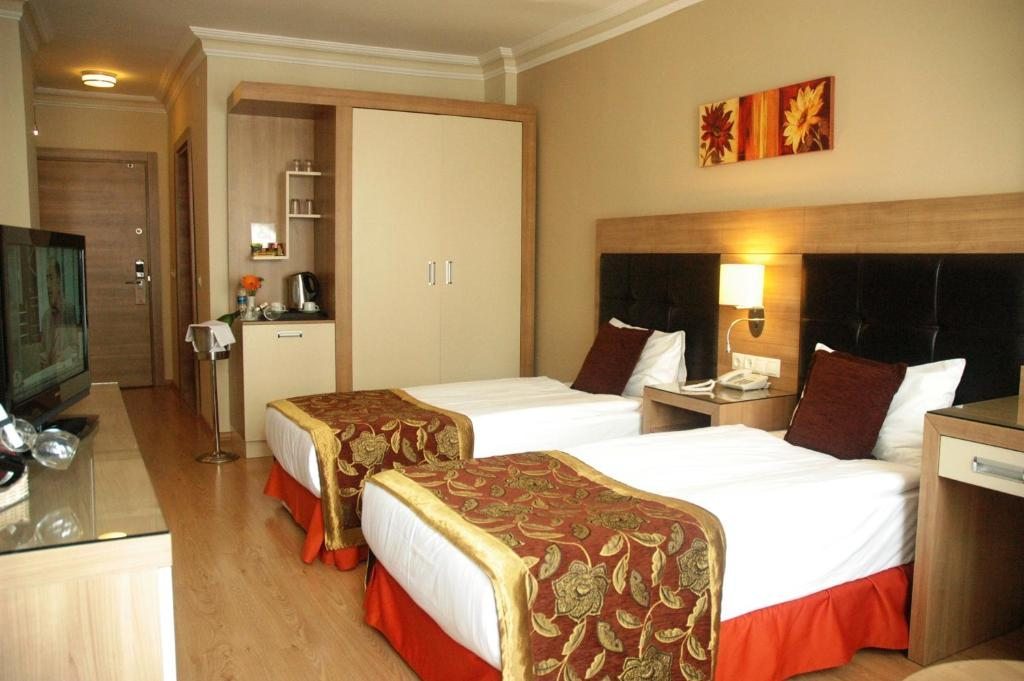 Двухместный (Улучшенный двухместный номер с 1 кроватью или 2 отдельными кроватями) отеля Suite Laguna, Анталия