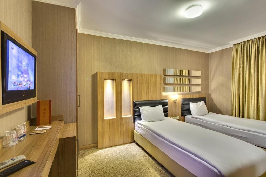 Двухместный (Стандартный двухместный номер с 2 отдельными кроватями) отеля Antroyal Hotel, Анталия