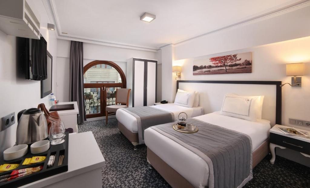 Двухместный (Стандартный двухместный номер с 2 отдельными кроватями) отеля Skalion Hotel & SPA, Стамбул