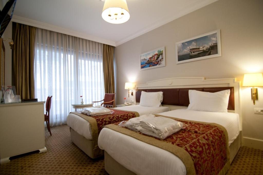 Двухместный (Стандартный двухместный номер с 1 кроватью или 2 отдельными кроватями) отеля Taksim Metropark Hotel, Стамбул