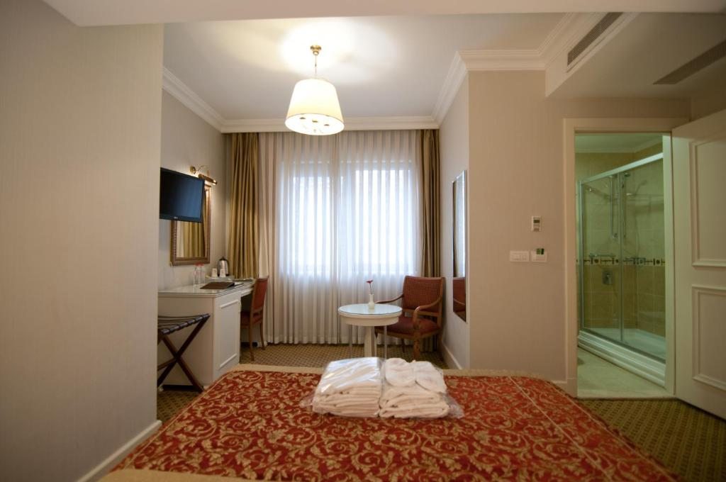 Двухместный (Специальное предложение - Двухместный номер эконом-класса с 1 кроватью или 2 отдельными кроватями) отеля Taksim Metropark Hotel, Стамбул